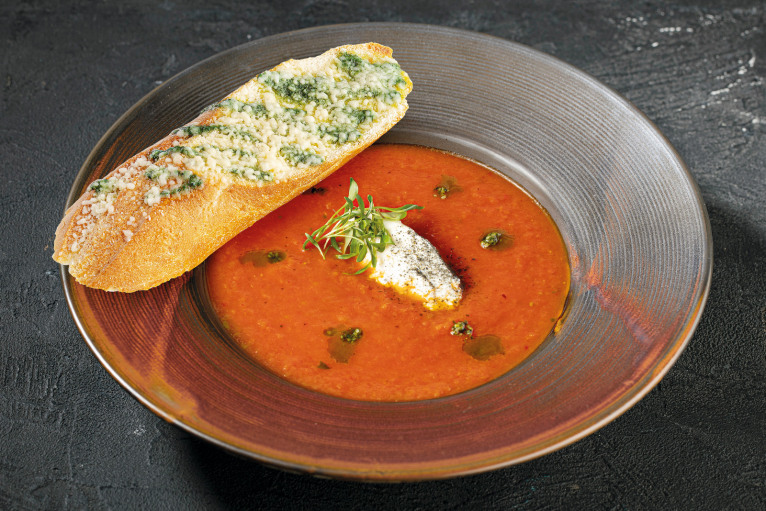 Tomato soup with burnt ricotta